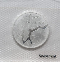 Münze Schweiz 20 Franken 2025 „Lago di Lugano“ Stempelglanz – Vorderseite zeigt den See in Vogelperspektive, Rückseite Symbol „Wasserturm Europas“.