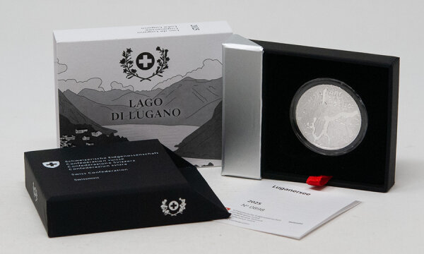 Münze Schweiz 20 Franken 2025 „Lago di Lugano“ Polierte Platte – Vorderseite zeigt den See in Vogelperspektive, Rückseite Symbol „Wasserturm Europas“.